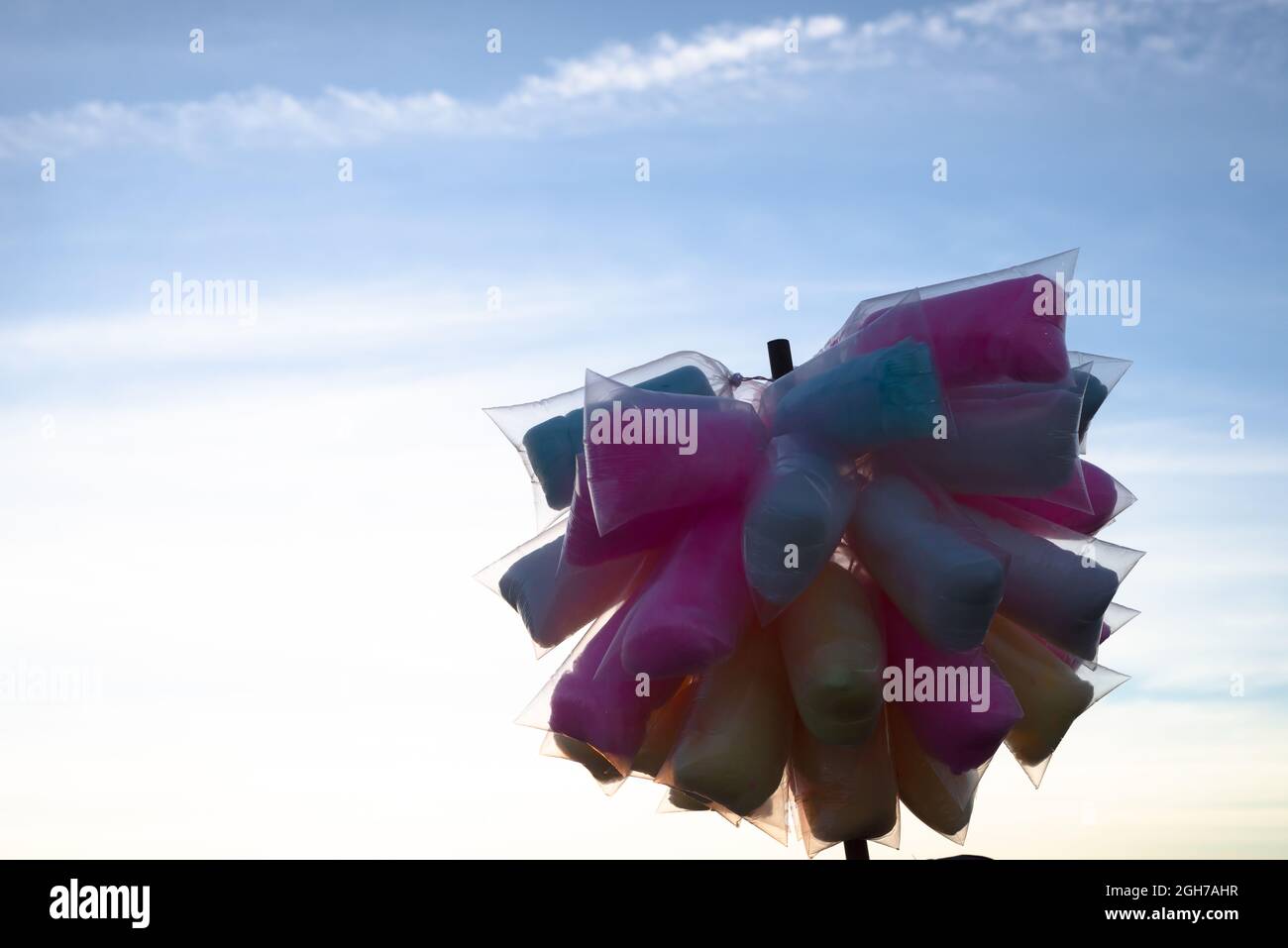 cotton candy being on sale at Farol da Barra in the late afternoon. Salvador, Bahia, Brazil. Stock Photo