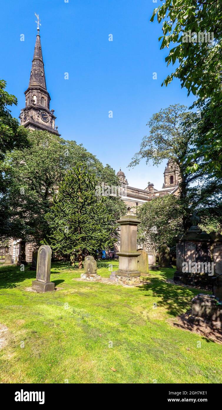 St John's Church from St Cuthbert's Cemetery in the centre of Edinburgh, Scotland, UK Stock Photo