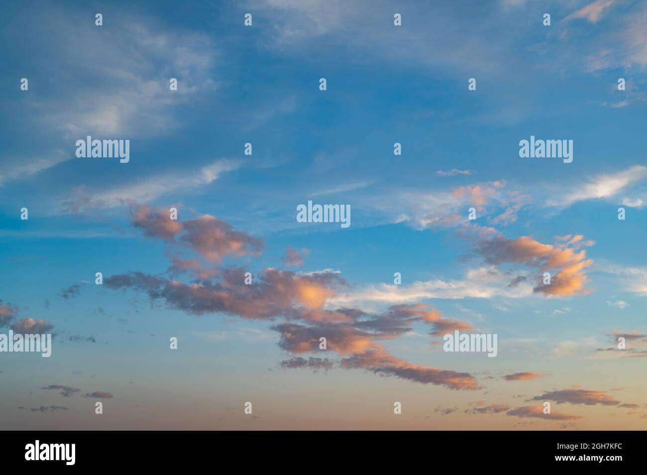 Sunset sky with orange clouds. Nature background Stock Photo - Alamy