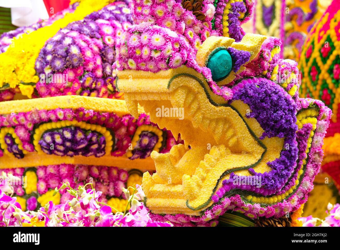 Details of elaborated fresh and dried flower decoration on a floral float, annual Chiang mai Flower Festival parade 2018 Stock Photo
