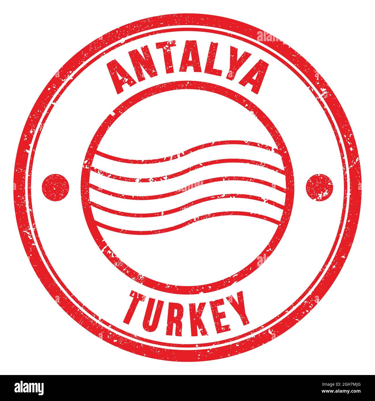 ANTALYA TURKEY, words written on red round postal stamp Stock Photo