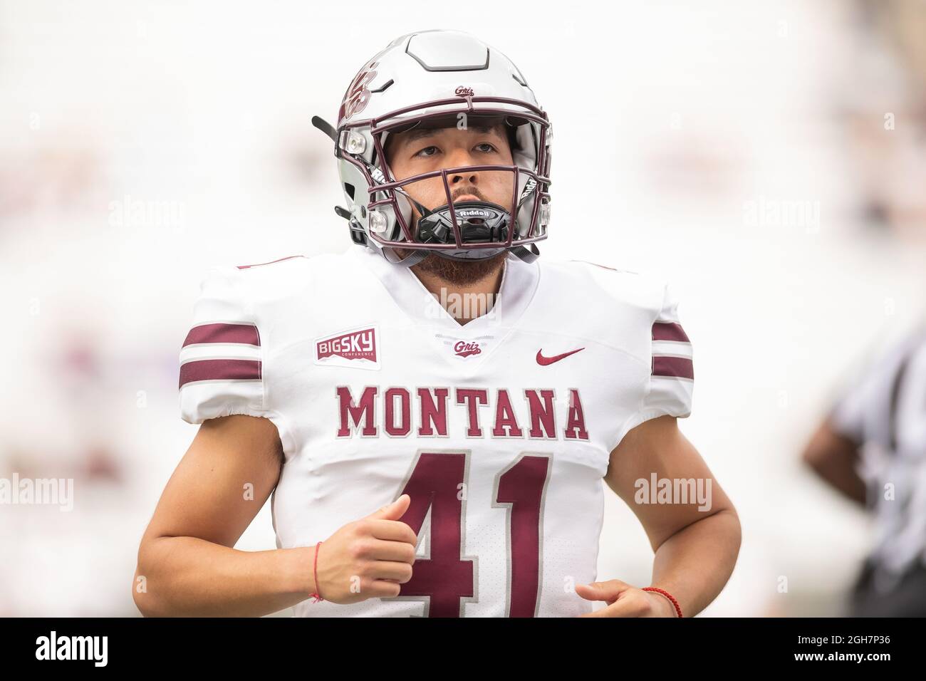 Montana Grizzlies place kicker Kevin Macias (41) on the field during warmups of an NCAA college football game between the Washington Huskies and the M Stock Photo