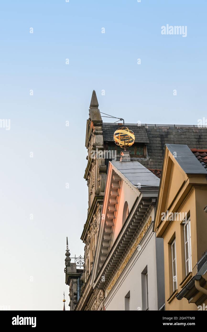 Stylized golden globe on the building of the non-profit organization Gemennutzige (Society for the Furtherance of Charitable Activities) in the old to Stock Photo