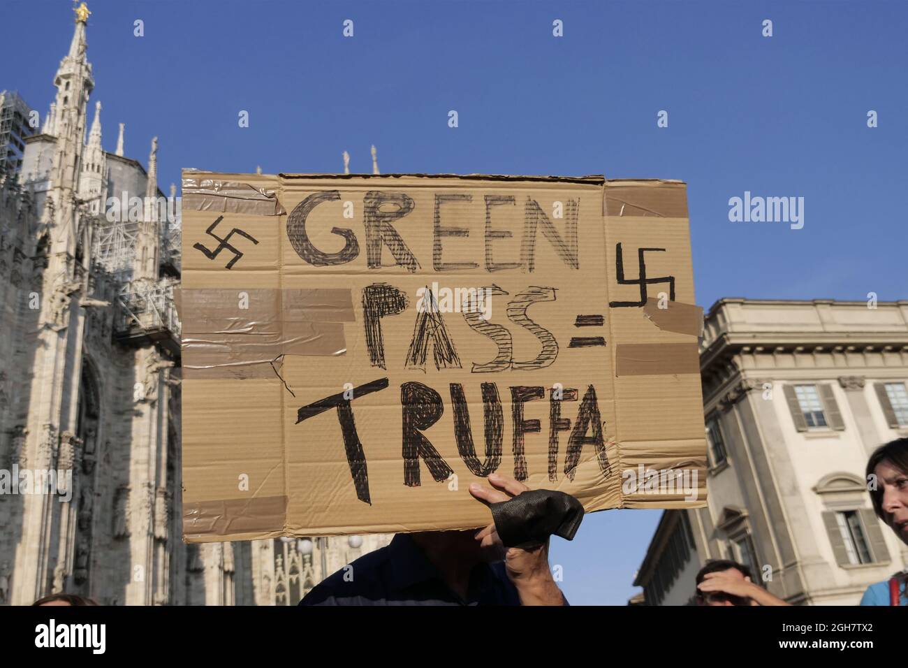 No green pass and no vax protest in Milan between the street of the city center. Stock Photo