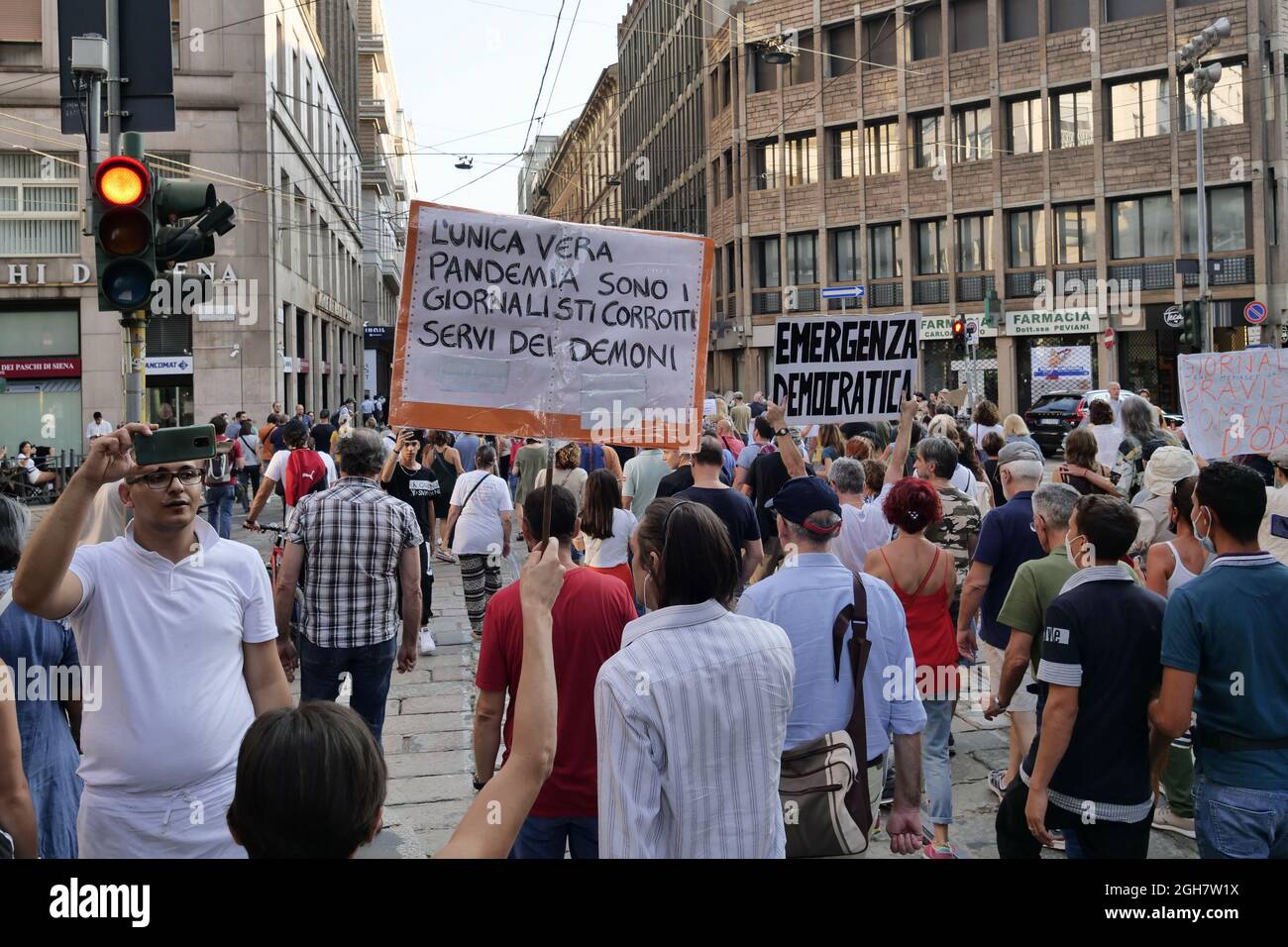 No green pass and no vax protest in Milan between the street of the city center. Stock Photo