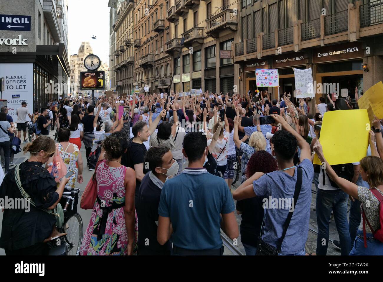 No green pass and no vax protest in Milan between the street of the city center. Stock Photo