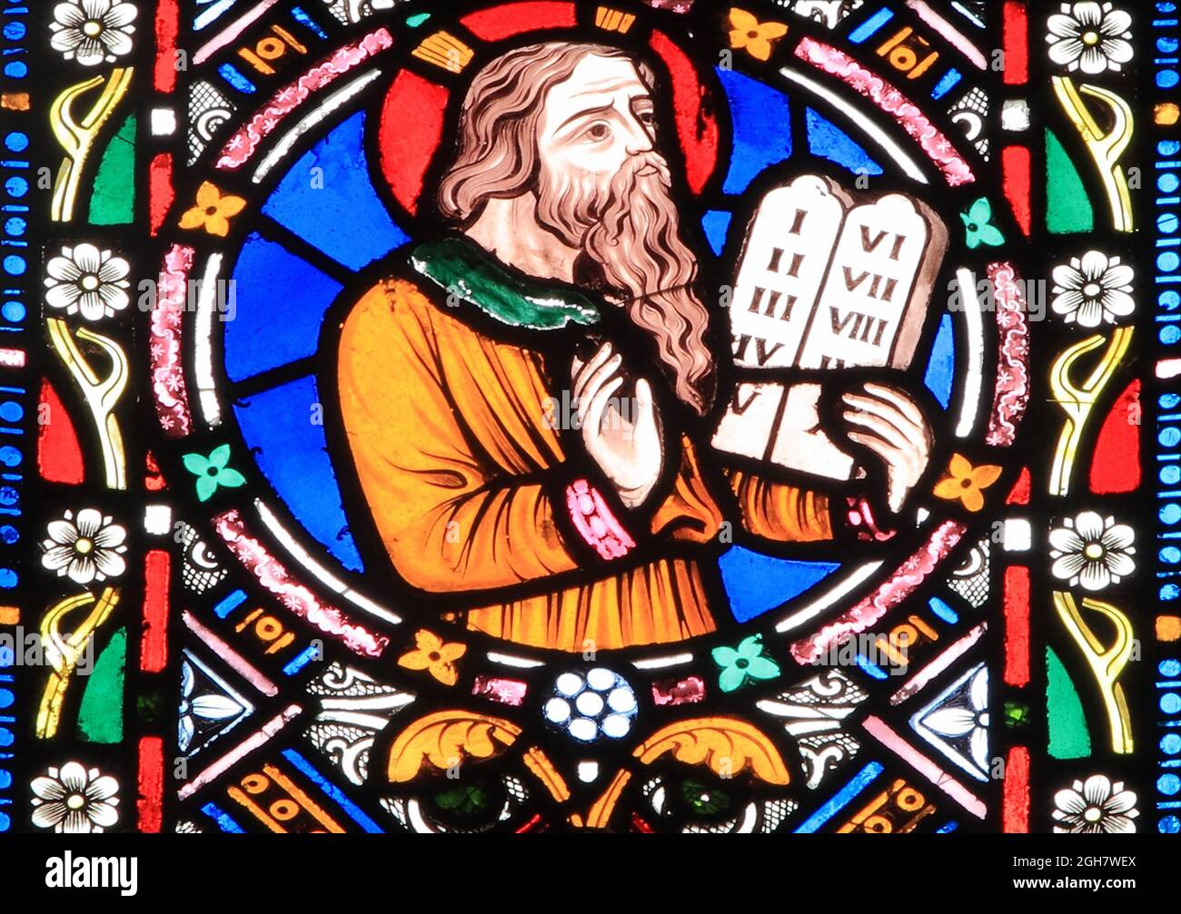 Moses, holding tablet of Ten Commandments, stained glass, window,  by Frederick Preedy, 19th century glass, Snettisham, Norfolk, England Stock Photo