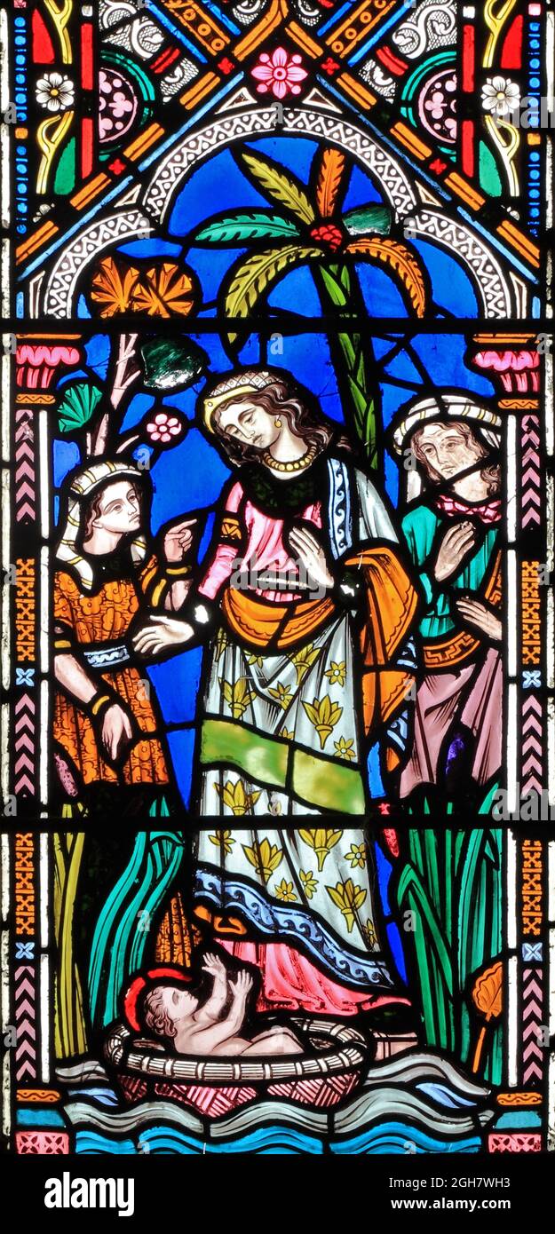 Moses, baby, found floating in basket in river, by Pharoah's daughter, stained glass, by Fredferick Preedy, stained glass, Snettisham, Norfolk, Stock Photo