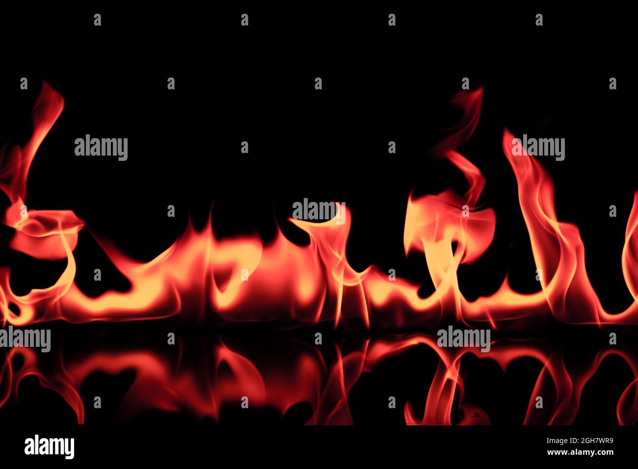 fire flames reflected in black background Stock Photo - Alamy