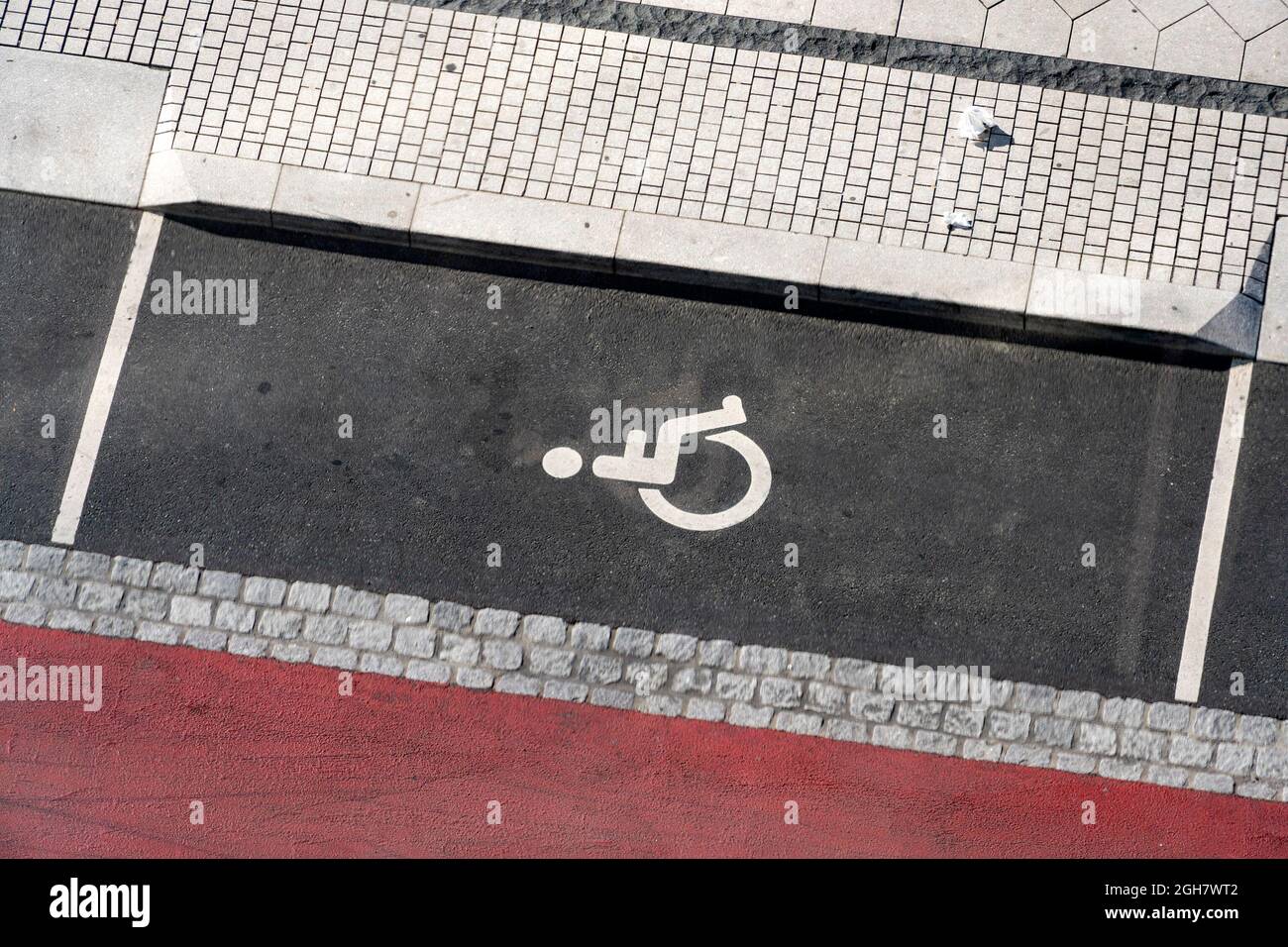 Aerial view of a disabled parking space with sign painted on the ground Stock Photo