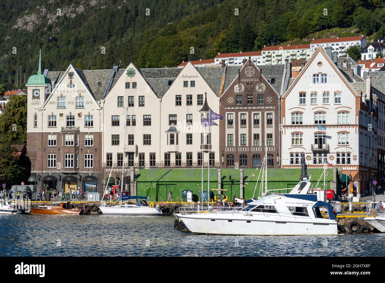 Bryggen, aka Tyskebryggen, is a series of Hanseatic heritage commercial buildings lining up the eastern side of the Vågen harbour in Bergen, Norway Stock Photo