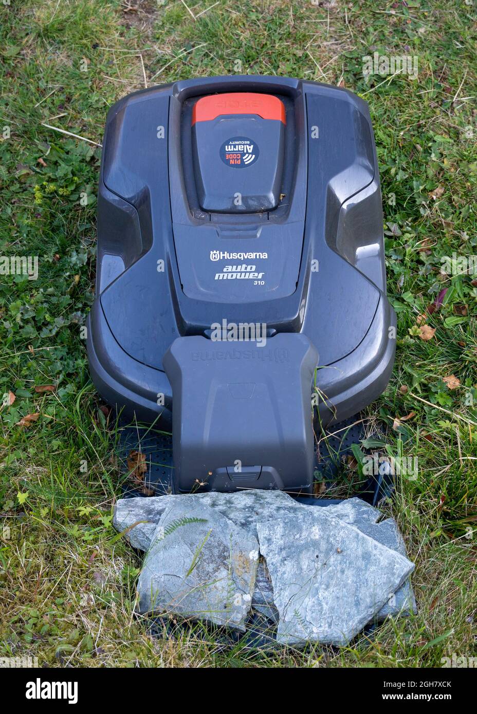 Husqvarna Auto Mower 310 robot lawn mower Stock Photo - Alamy