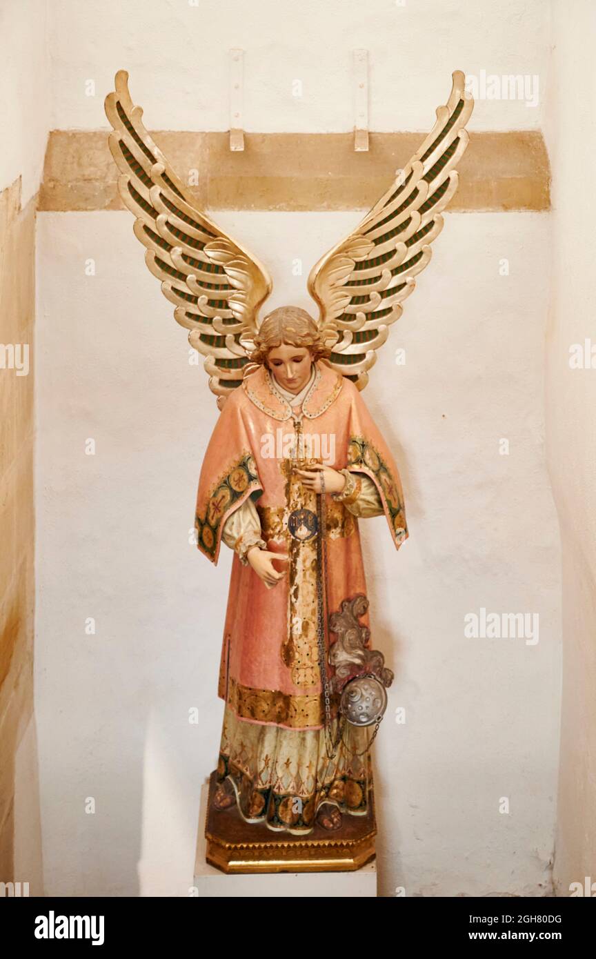 Angel with wings at First diocesan built museum in Spain, Museo Diocesano Regina Coeli, Santillana del Mar, Cantabria, Spain Stock Photo