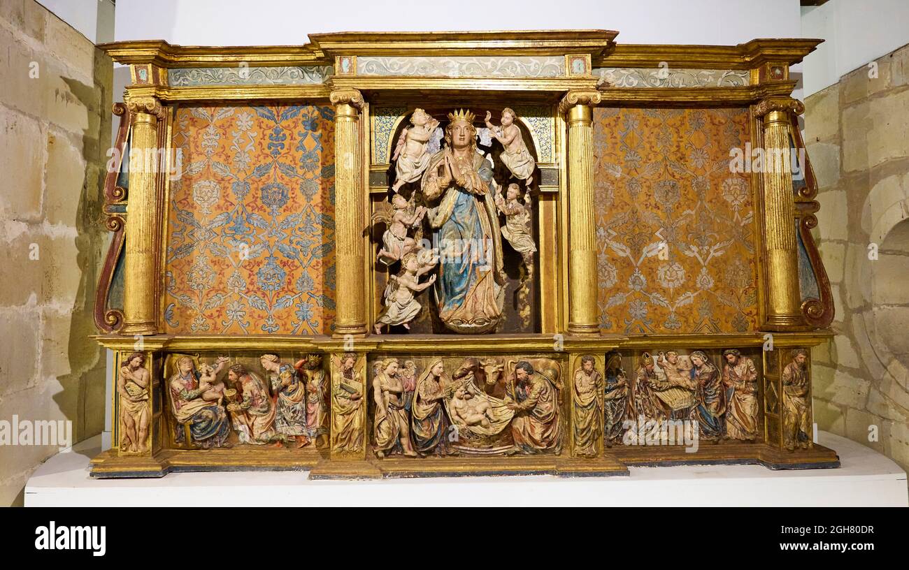 Aniezo altarpiece in 16th century polychrome wood, First diocesan built museum in Spain, Museo Diocesano Regina Coeli, Santillana del Mar, Cantabria, Stock Photo