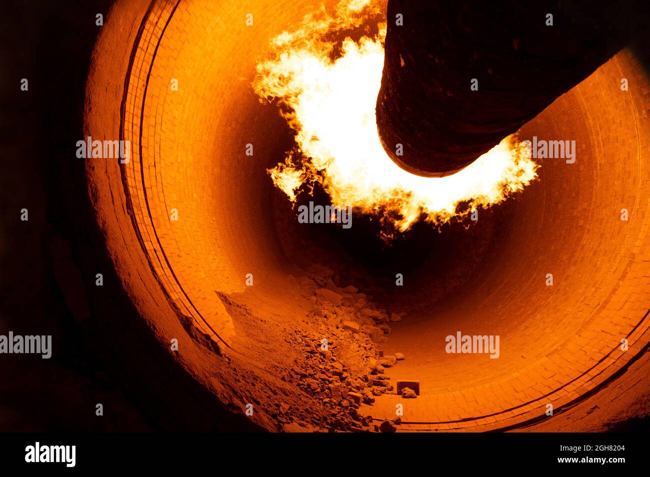 Closeup of a rotary kiln for clinker production in a cement plant Stock Photo