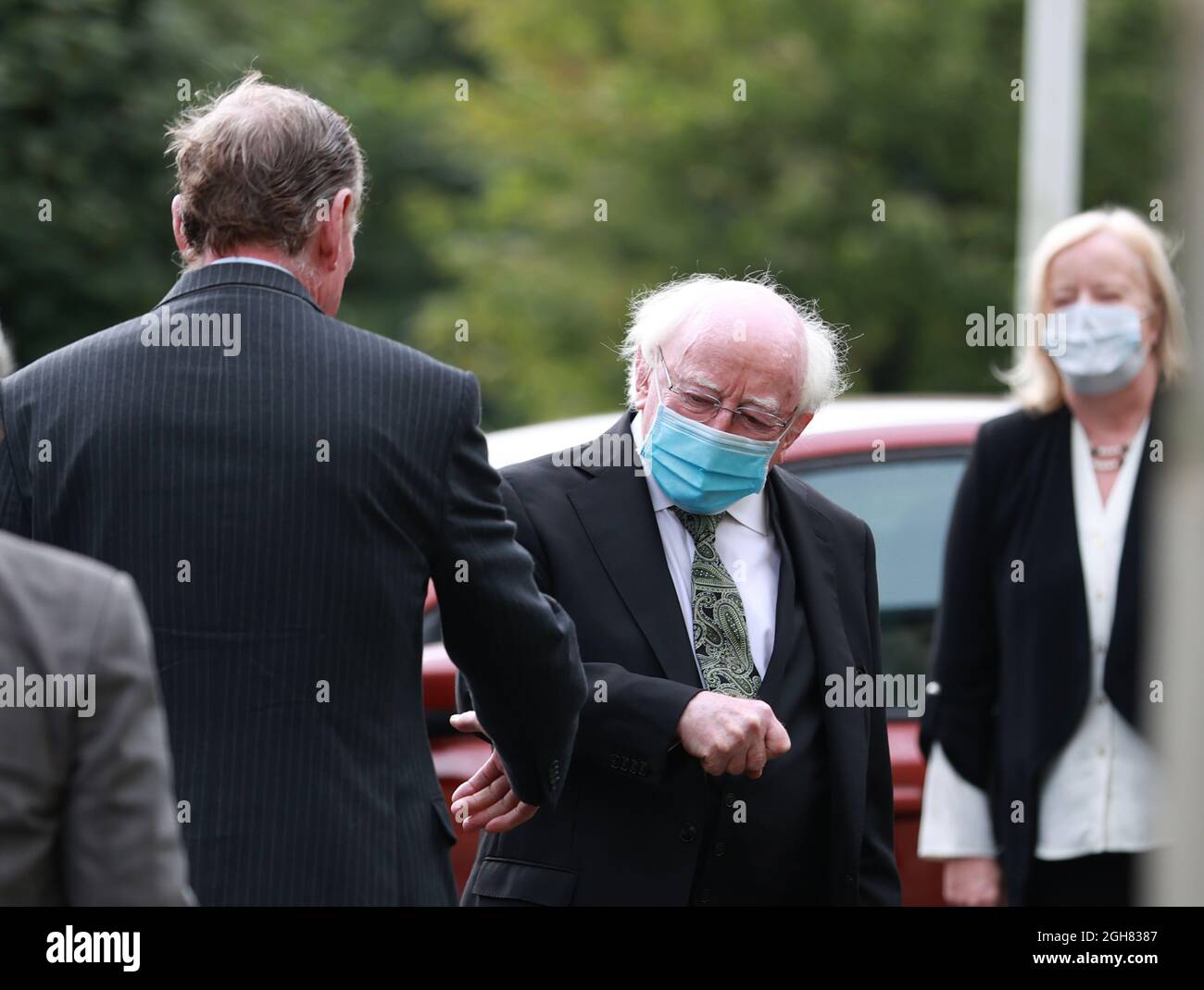 Former Stormont first minister Lord David Trimble (left) greets Michael D. Higgins, the President of, during the funeral of Pat Hume, the wife of former SDLP leader and Nobel Laureate John Hume, at St Eugene's Cathedral in Londonderry. Picture date: Monday September 6, 2021. Stock Photo