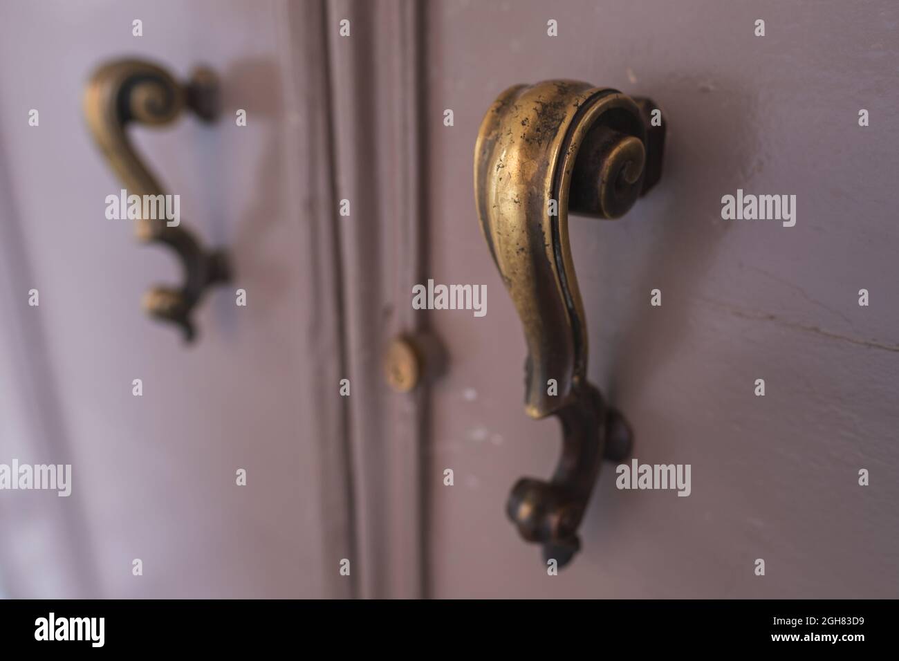 Ancient italian door handle close-up Stock Photo