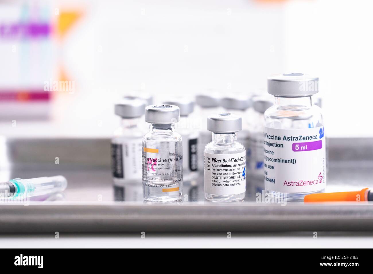 Thailand - AUG 27 , 2021 Close up of Sinovac,Pfizer,astrazeneca Vaccine vials bottles for stop pandemic ,COVID-19 vaccines can help reduce the Stock Photo