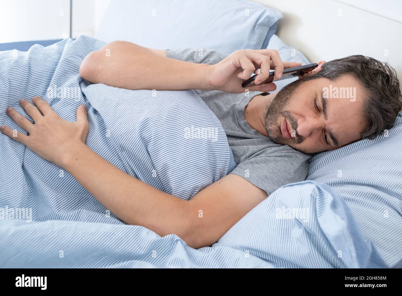 Mobile phone sad pain hires stock photography and images Alamy