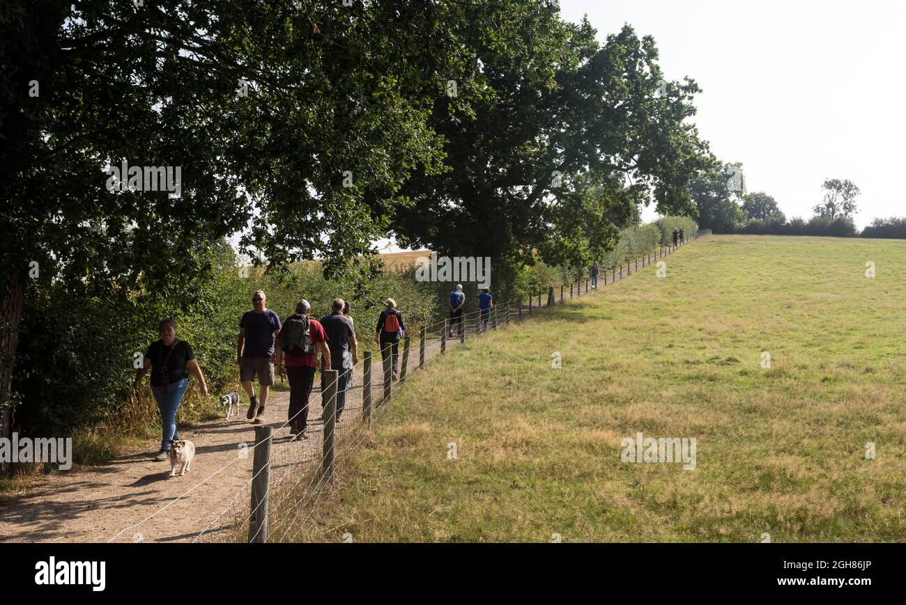 People walking on the pathway around the Bosworth Battlefield site, Leicestershire, England, UK Stock Photo