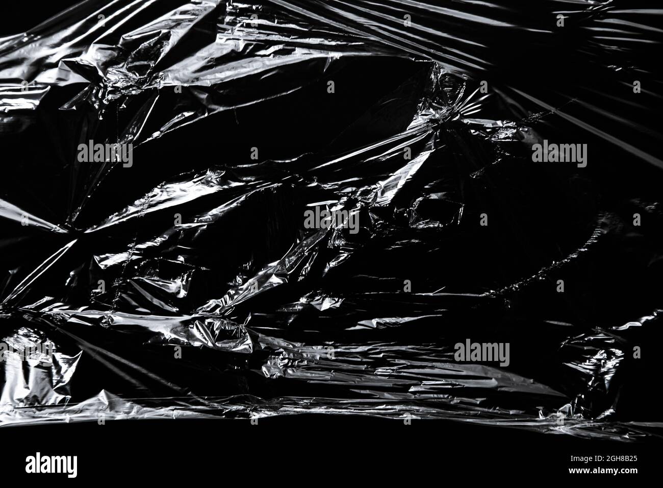 Photo of the polyethylene surface on black background Stock Photo