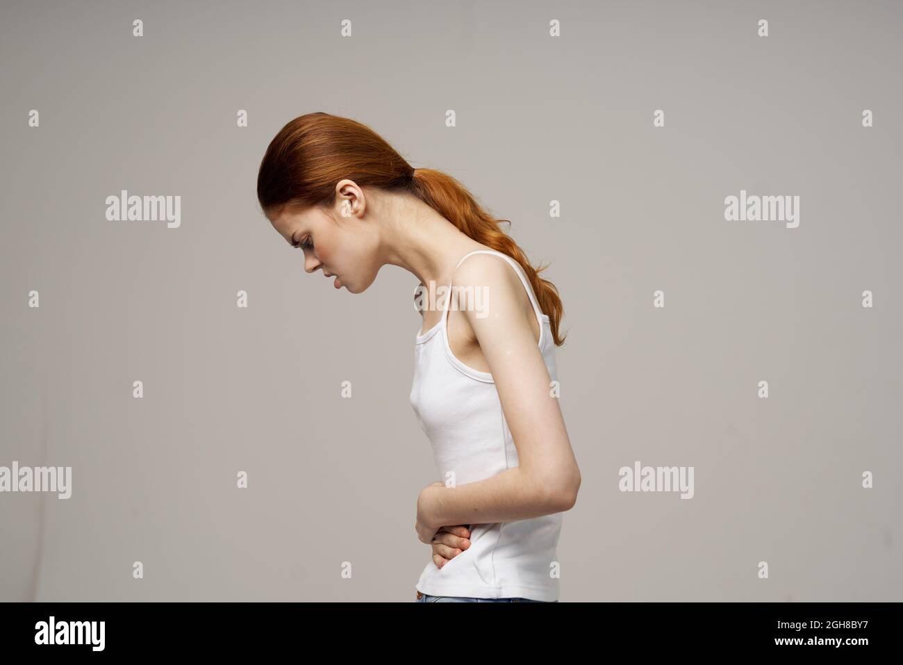 woman groin pain intimate illness gynecology discomfort light background  Stock Photo - Alamy