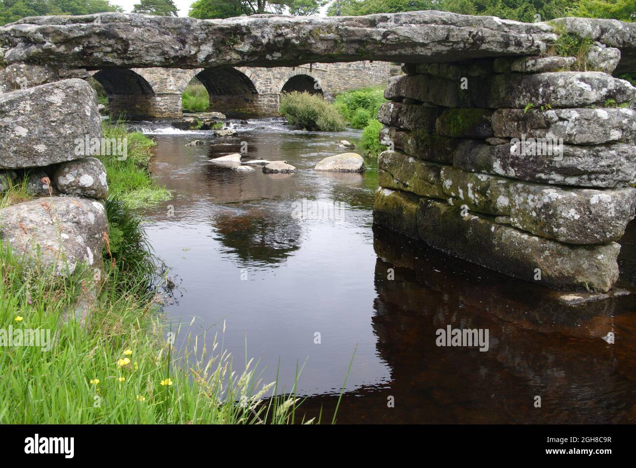 the ancient clapper bridge at post bridge on dartmoor devon Stock Photo