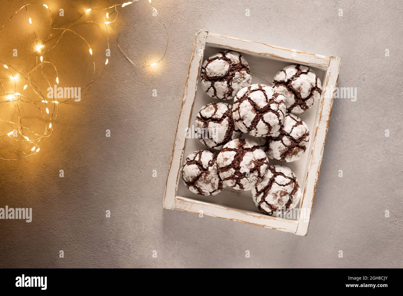 chocolate crinkle cookies in wooden box Stock Photo Alamy