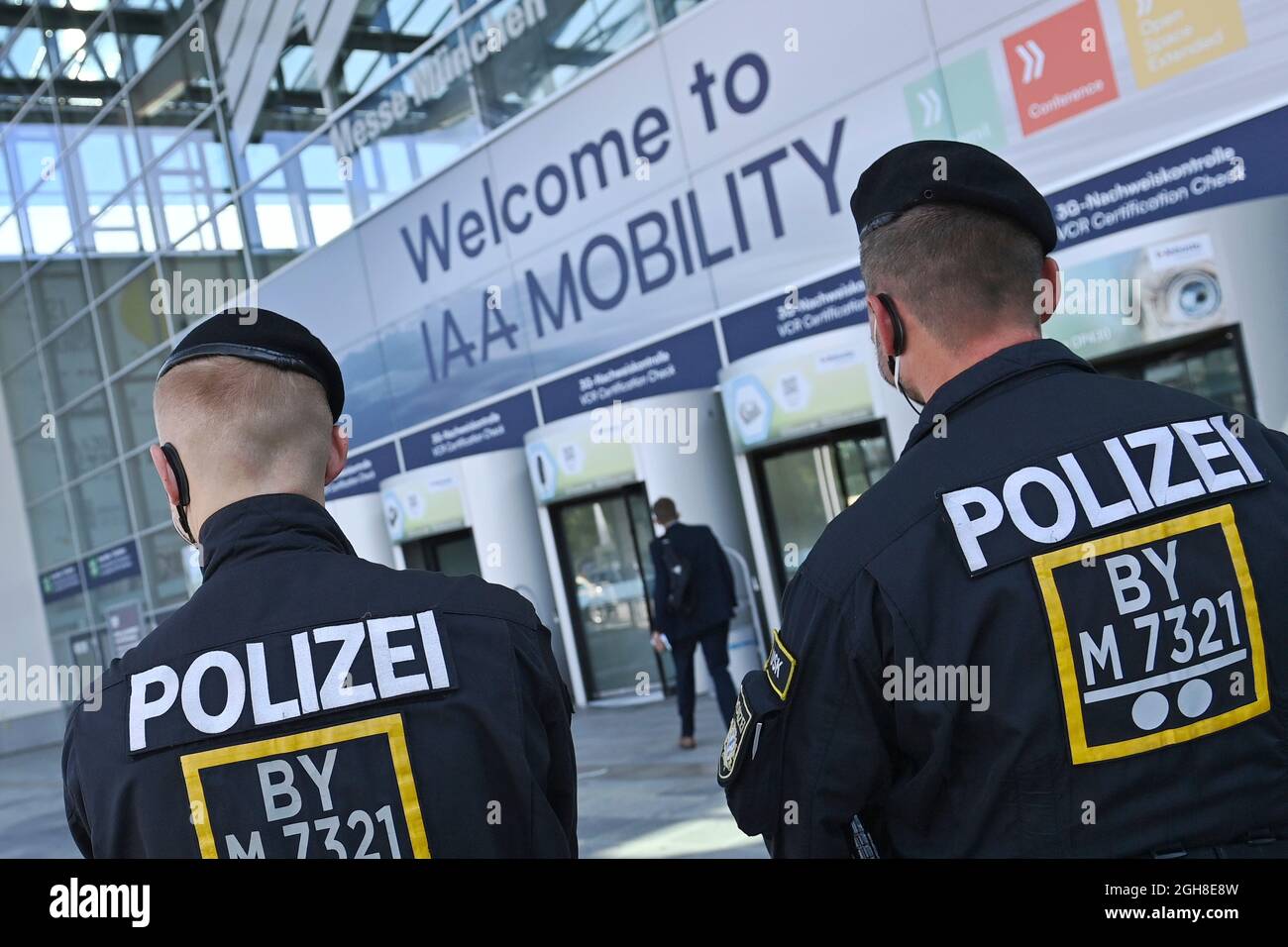 Police, police officers in front of the West Entrance at the Messe Muenchen  Riem. Safety measures, safety precautions in front of demonstrators, IAA  Mobility trade fair from September 7th to September 12th,