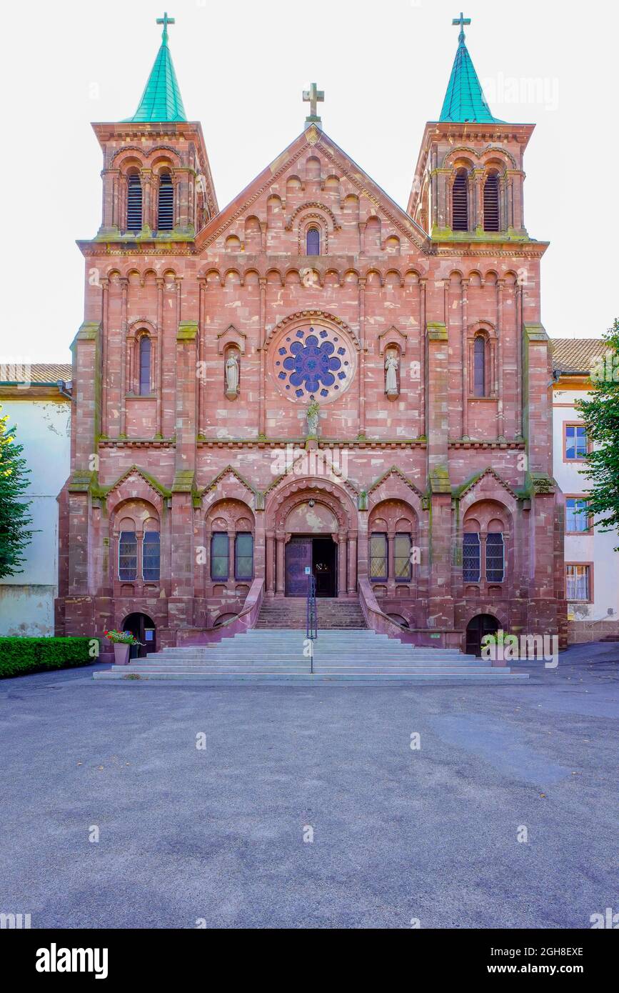 West facade of church at Oelenberg Abbey is a Trappist monastery (Order of Cistercians of the Strict Observance), located in Reiningue near Mulhouse, Stock Photo