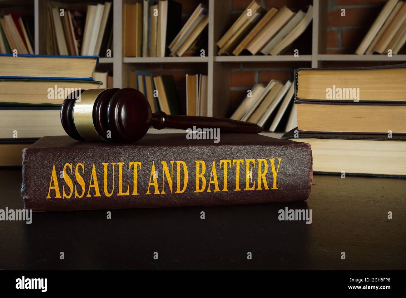 Law about assault and battery and gavel. Stock Photo