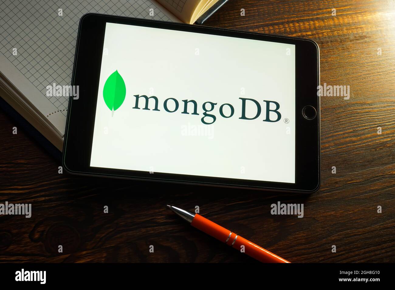KYIV, UKRAINE - August 21, 2021. Tablet with MongoDB Atlas Database logo. Stock Photo