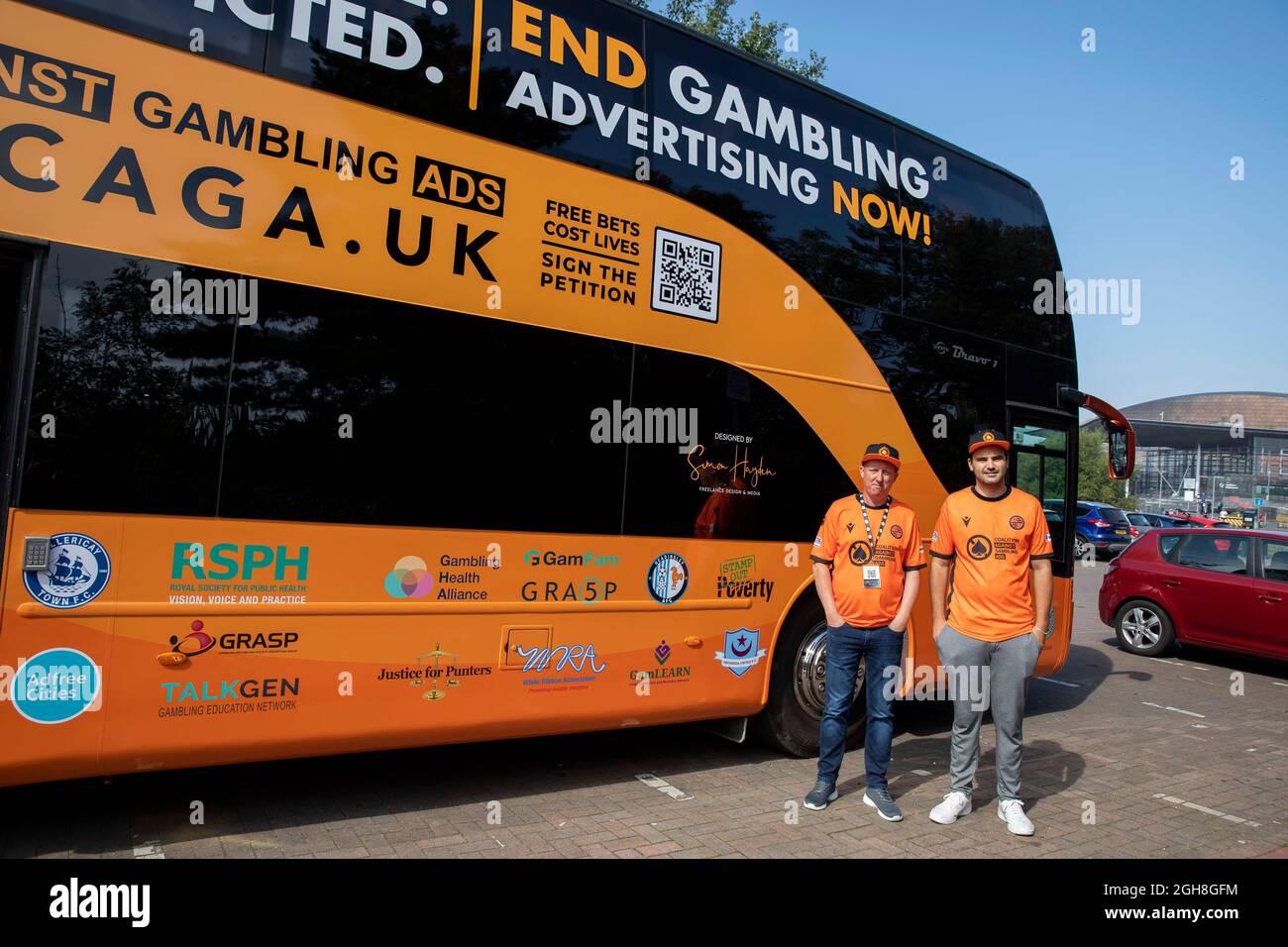 Cardiff, Wales, UK. 6th Sep, 2021. Nick Phillips and Matt Zarb-Cousin with the Coalition Against Gambling Ads (CAGA) bus near the Senedd Cymru Welsh Parliament in Cardiff Bay, on the first day of its UK-wide city tour. The campaign aims to end all gambling advertising, promotion and sponsorship. Nick Phillips says gambling left him suicidal and bankrupt. Director of CAGA, Zarb-Cousin, says people should not be encouraged to gamble. Credit: Mark Hawkins/Alamy Live News Stock Photo