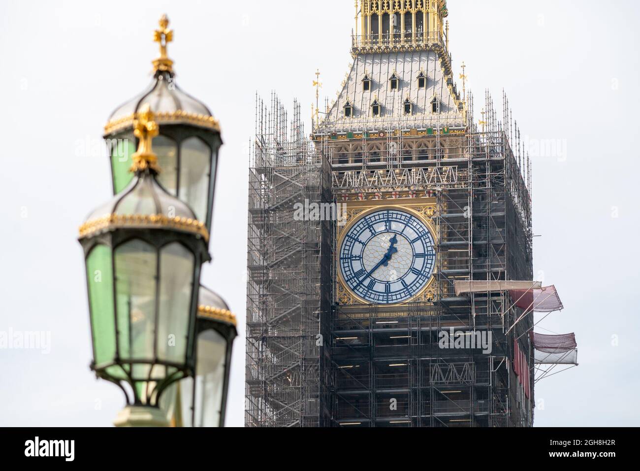 The restored clock hands, which have been painted to match the original ...