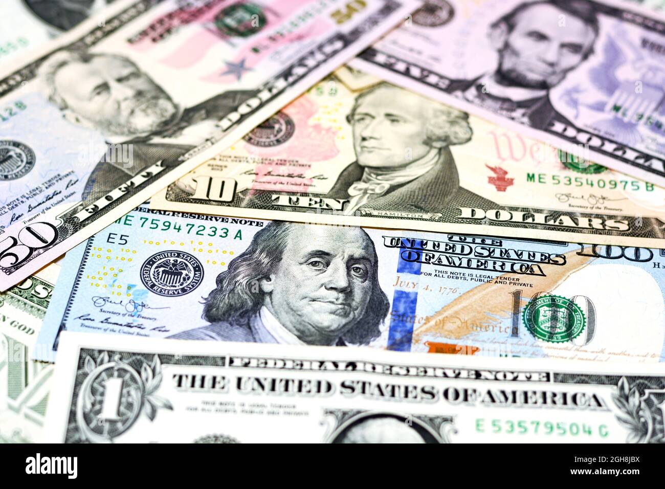 Selective focus of a background of american money banknotes of