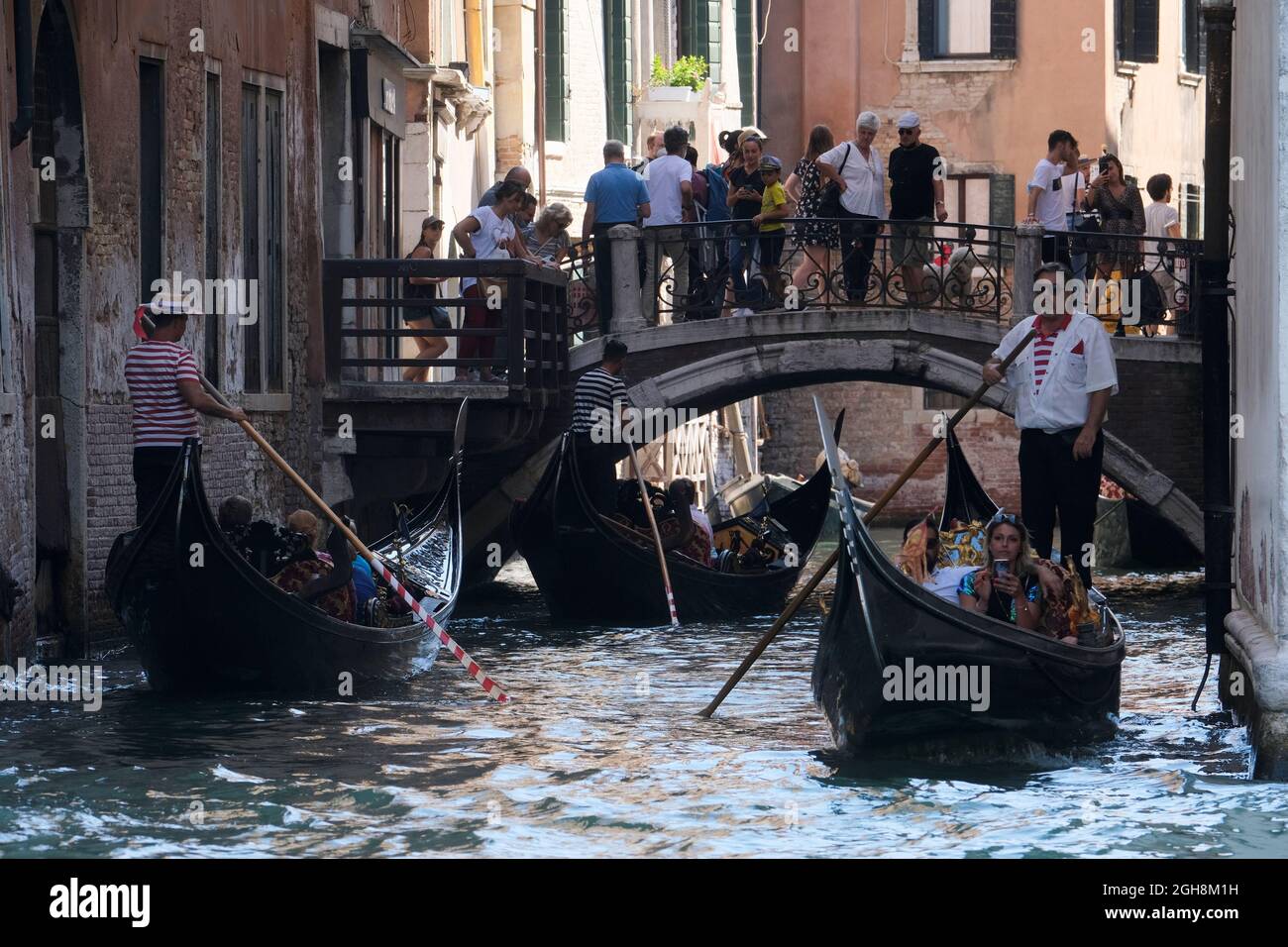 Tourists visit Venice as the municipality prepares to charge them up to 10 Euro for entry into the lagoon city, in order to cut down the number of visitors, in Venice, Italy, September 5, 2021. Picture taken September 5, 2021. REUTERS/Manuel Silvestri Stock Photo