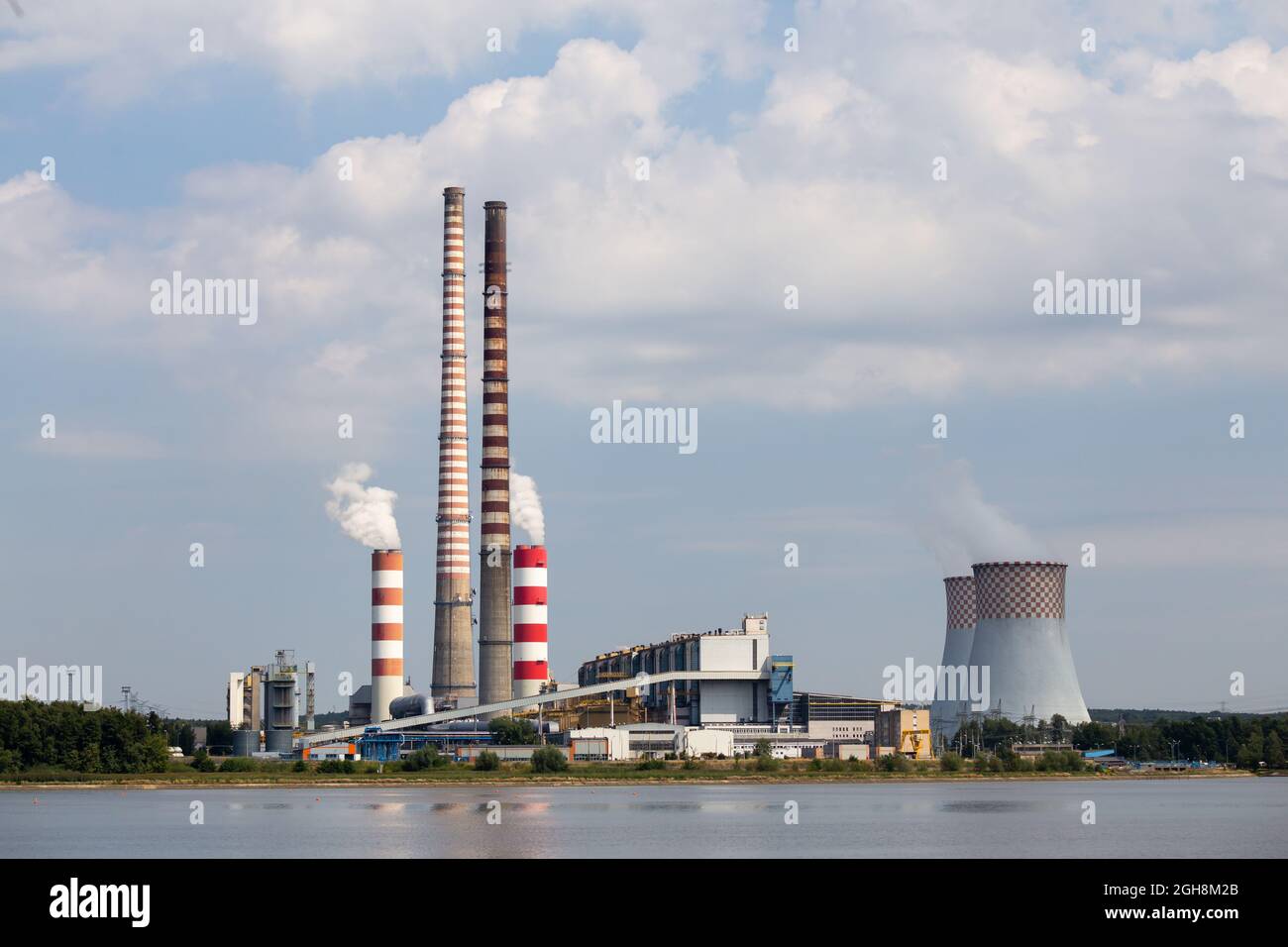 Distant view of the coal-fired power plant. Photo taken on a sunny day with good lighting conditions. Stock Photo