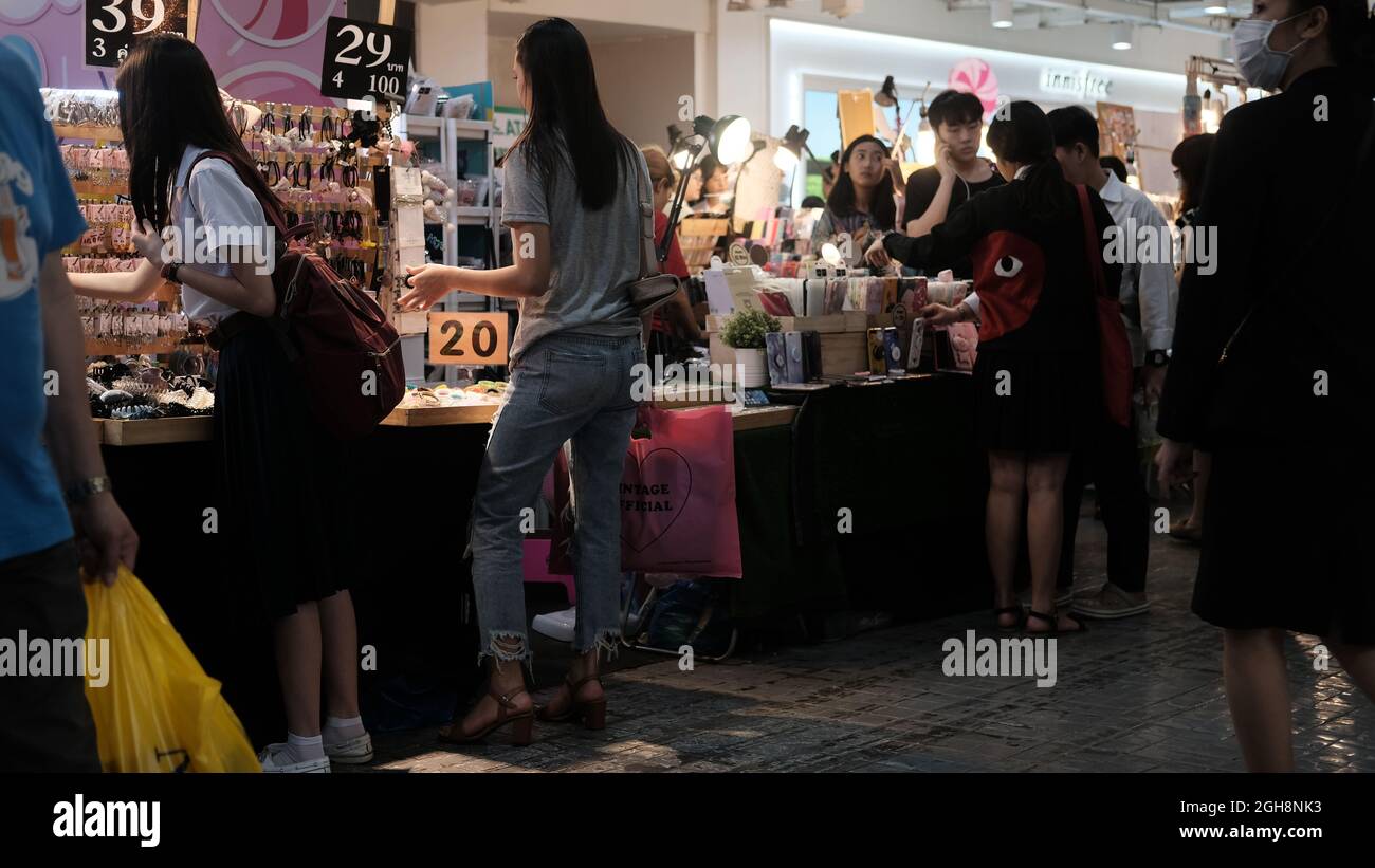 Student Girls at Fashion Accessory Shop  Siam Square Lively FunFill Place for Shopping and Gathering before the Pandemic Lockdown Bangkok Thailand Stock Photo