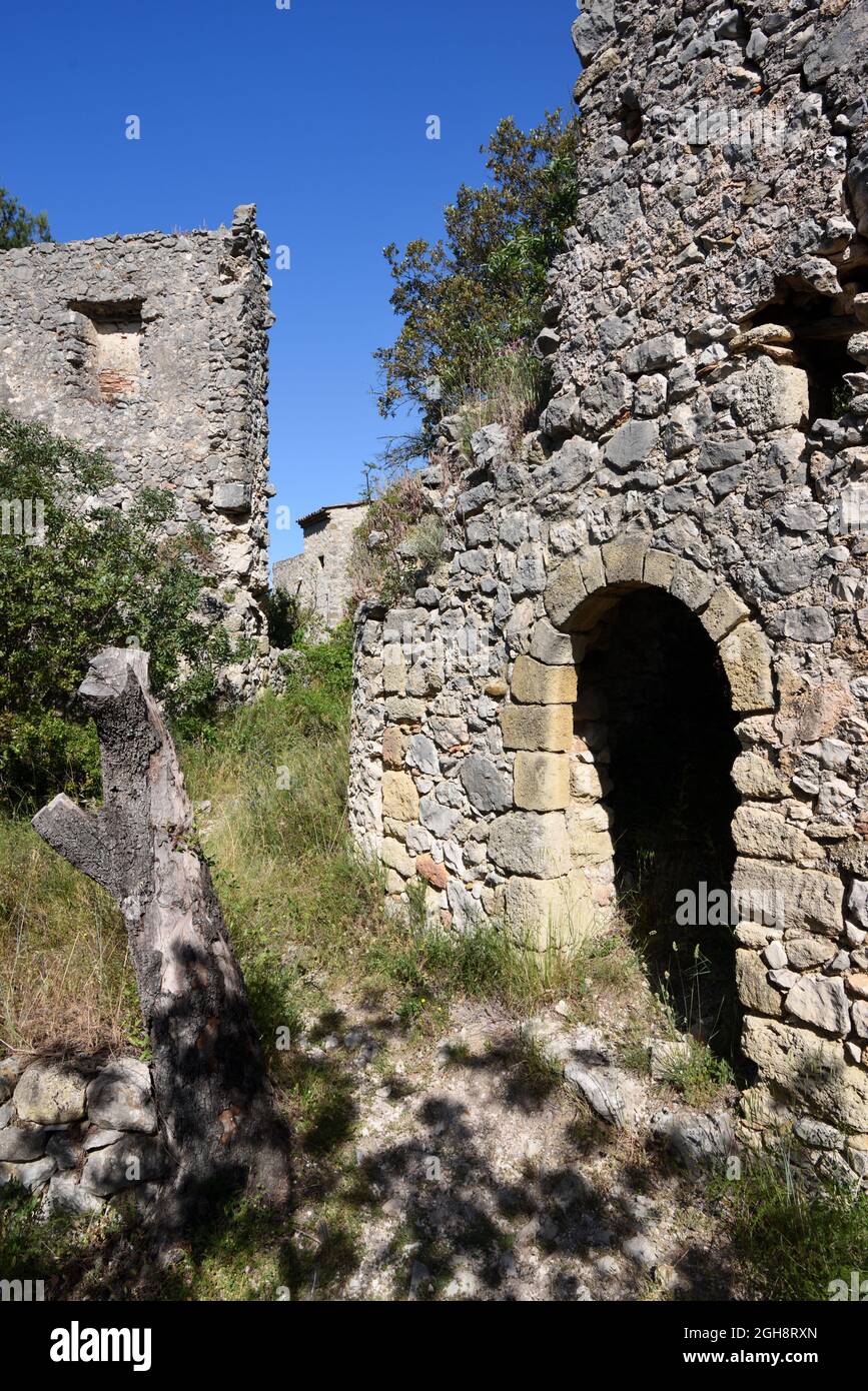 Ruins including Ruined Stone Houses in the Destroyed & Abandoned Village of Merindol, scene of the Merindol Massacre (1545) Provence France Stock Photo