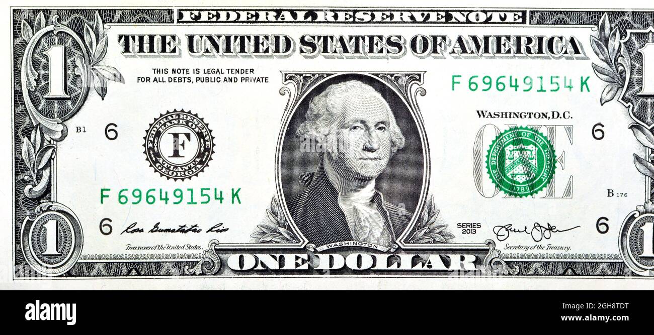 Large fragment of the Obverse side of 1 one dollar bill banknote  with the portrait of president George Washington, old American money bank Stock Photo
