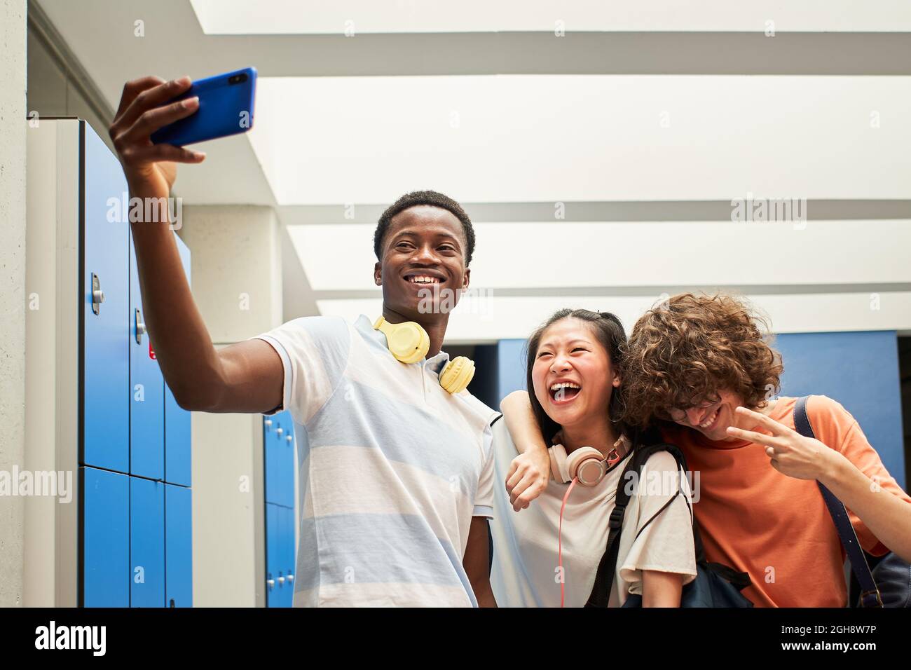 Multi-ethnic group of students taking a selfie at the college Stock ...