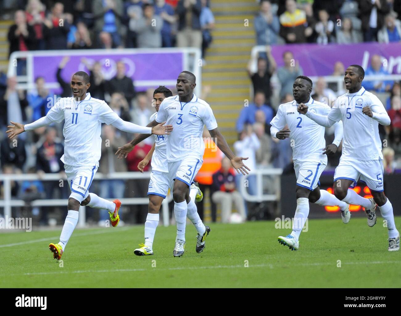 Honduras' Jerry Bengtson (L) celebrates scoring his side's first goal during the London Olympic 2012 first round Group D men's match between Spain v Honduras at the St. James' Park, Newcastle upon Tyne on the 29th July 2012. Stock Photo