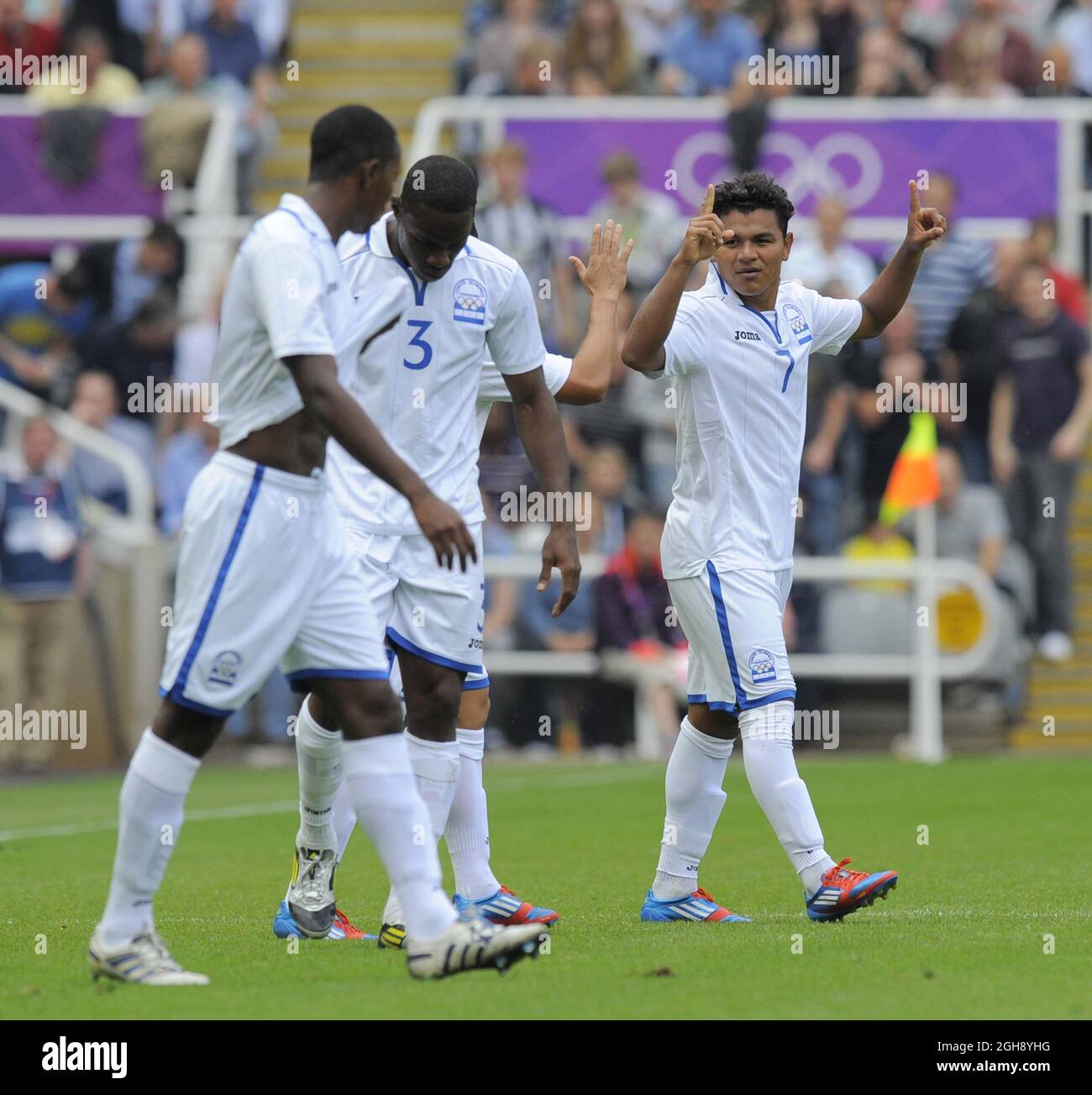 Honduras' Mario Martinez (R) celebrates scoring his side's first goal during the London Olympic 2012 quarter final men's football match between Brazil v Honduras at St. James' Park, Newcastle upon Tyne on the 4th August 2012. Stock Photo