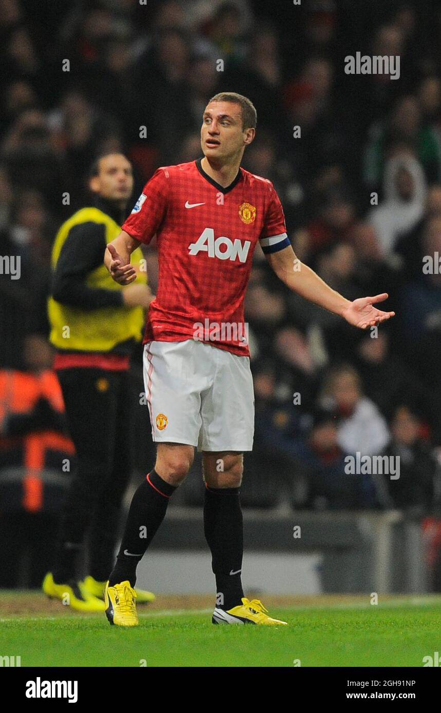Nemanja Vidic of Manchester United gestures to get back into the game after  receiving treatment for a cut to his eye during the FA Cup, Fifth Round  Replay between Manchester United and, image size:859x1390