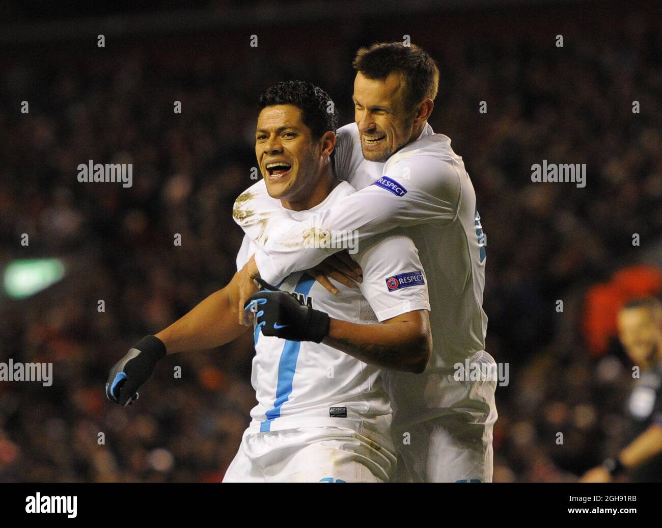 Hulk of Zenit St Petersburg (L) celebrates his goal during the UEFA Europa League Round of 32, Second Leg match between Liverpool and Zenit St Petersburg at the Anfield Stadium in Liverpool, United Kingdom on February 21, 2013. Stock Photo