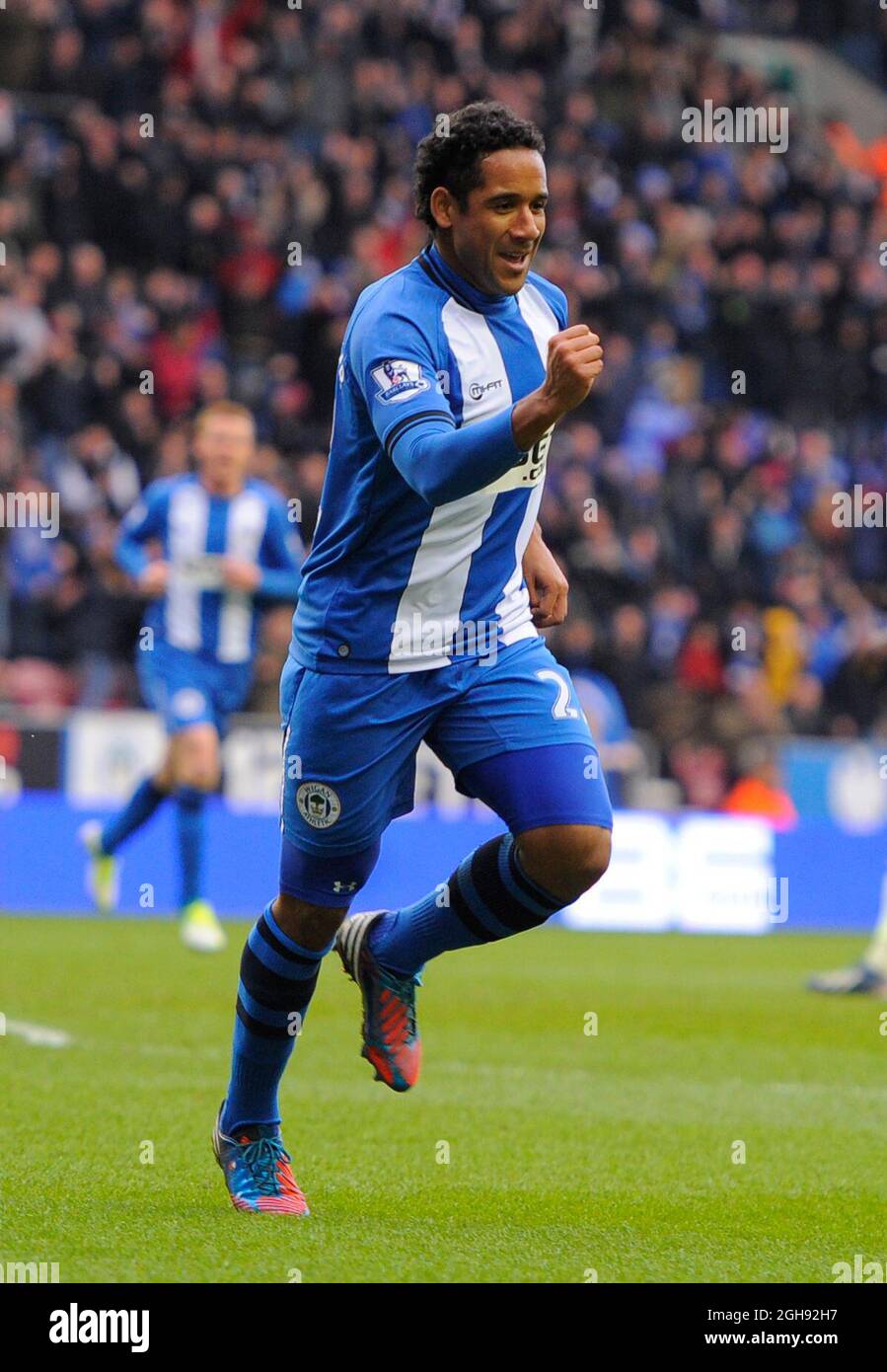 Jean Beausejour of Wigan Athletic celebrates scoring the first goal during the Barclays Premier League between Wigan Athletic and Newcastle United at the DW Stadium in Wigan on March 17, 2013. Picture Simon Bellis. Stock Photo