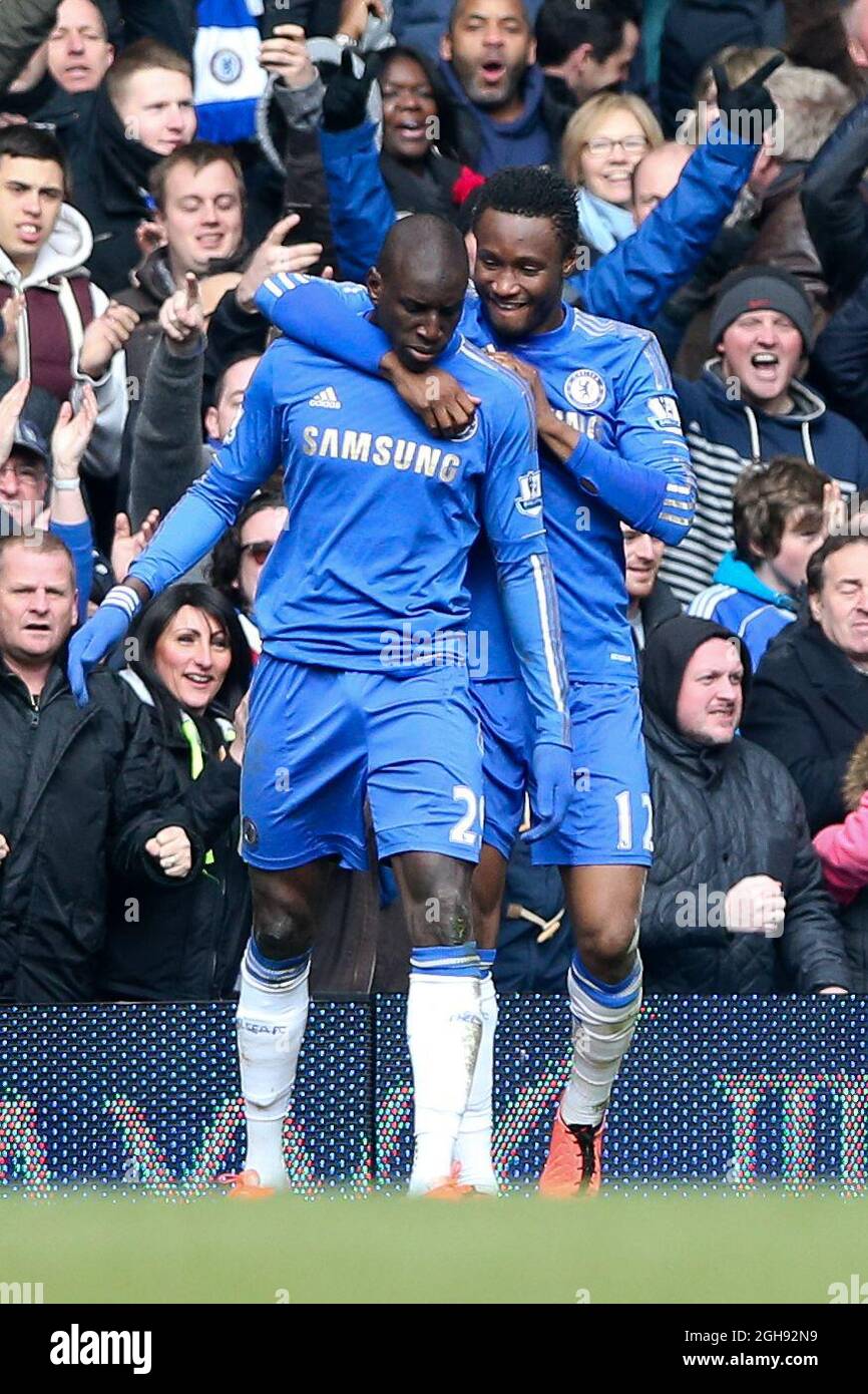 Demba Ba of Chelsea celebrates scoring with John Mikel Obi of Chelsea during the FA Cup Final Replay match between Chelsea and Manchester United at Stamford Bridge, London on April 1, 2013. Stock Photo