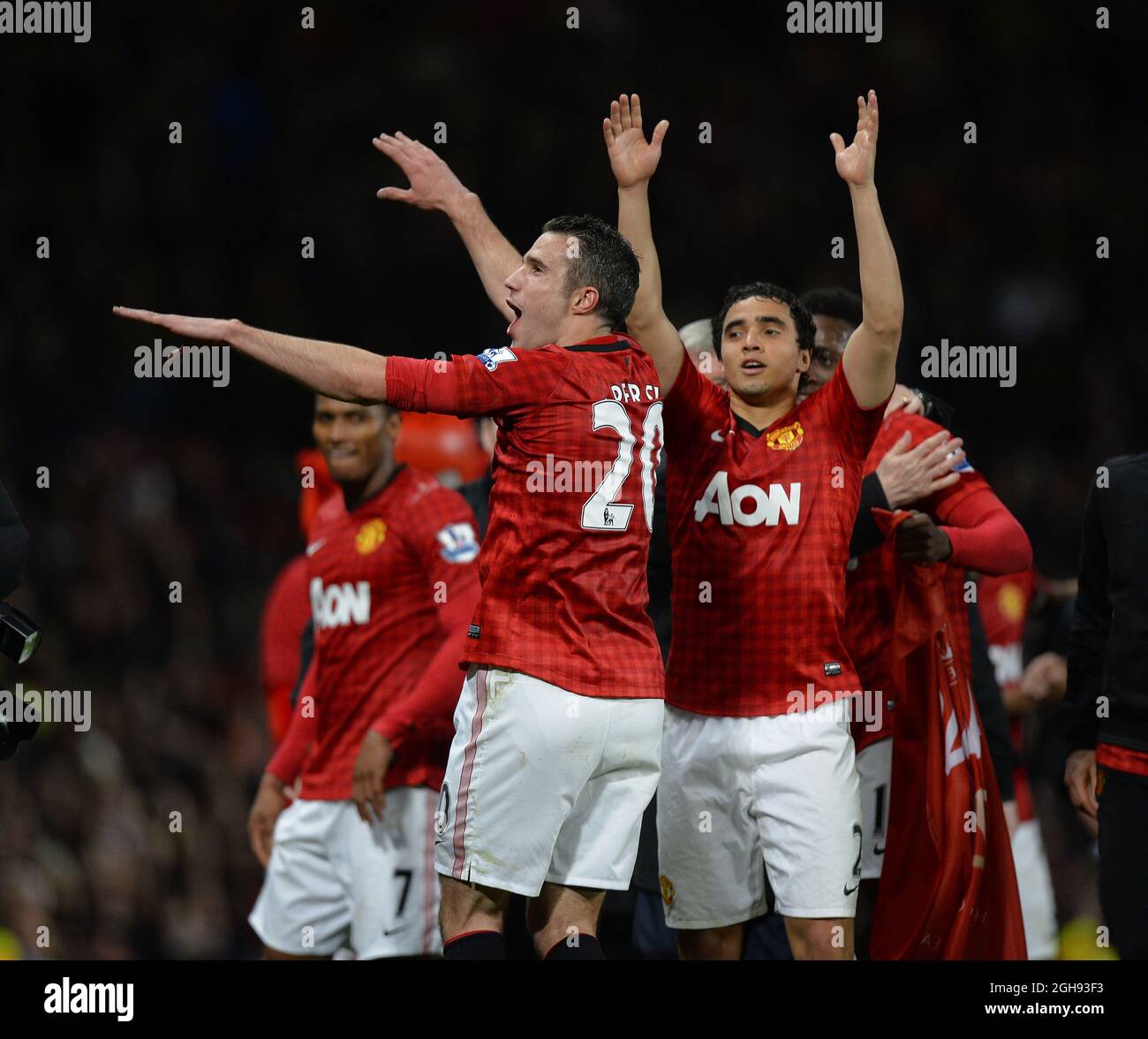Robin van Persie of Manchester United and Rafael Pereira da Silva of Manchester United celebrates during the Barclays Premier League match between Manchester United and Aston Villa in Old Trafford Stadium on April 22, 2013. Stock Photo