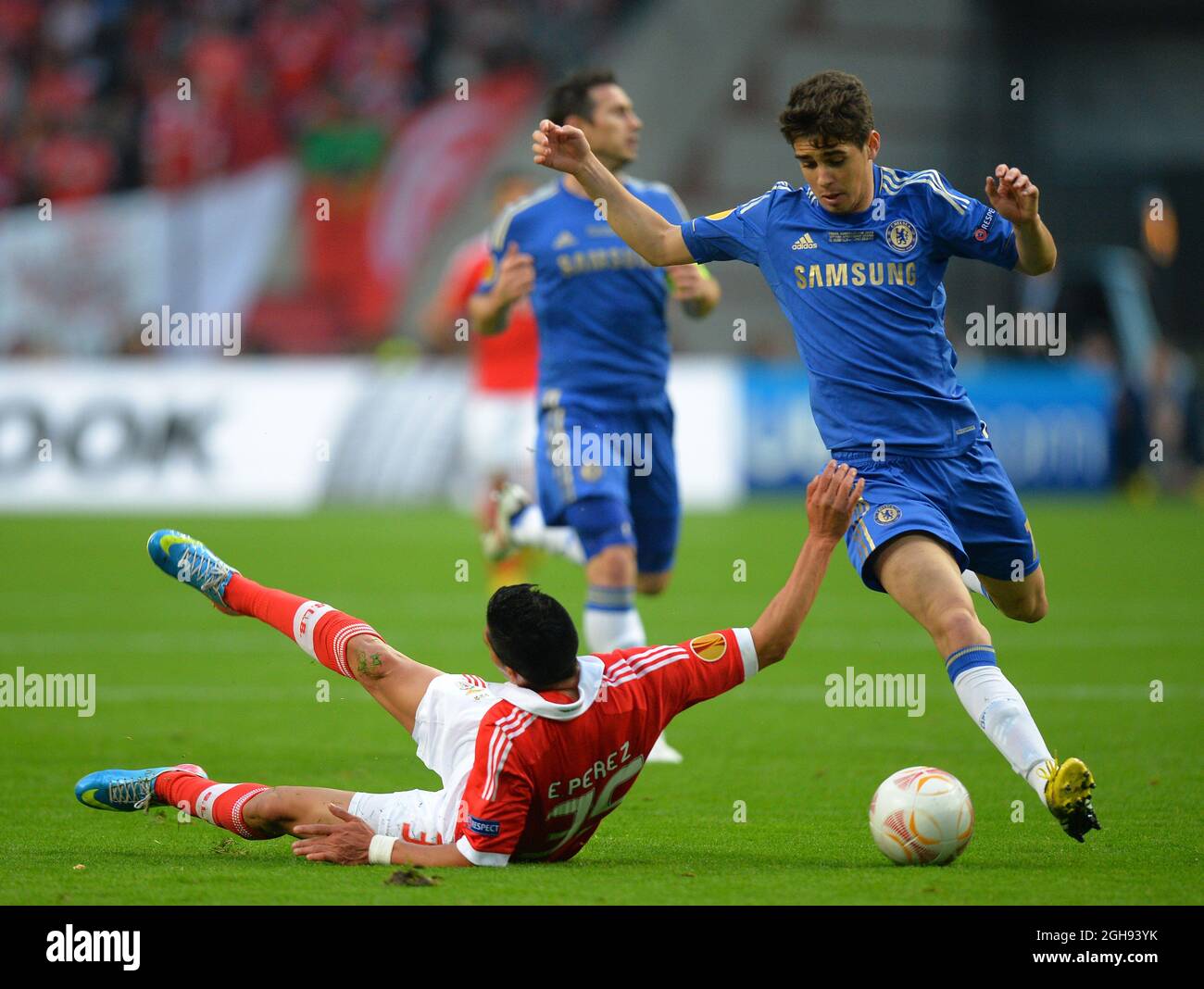 Enzo Perez of SL Benfica tussles with Oscar of Chelsea during the UEFA Europa League Final match between Benfica and Chelsea at the Amsterdam Arena in Amsterdam, Netherlands on May 15, 2013. Picture Simon Bellis Stock Photo
