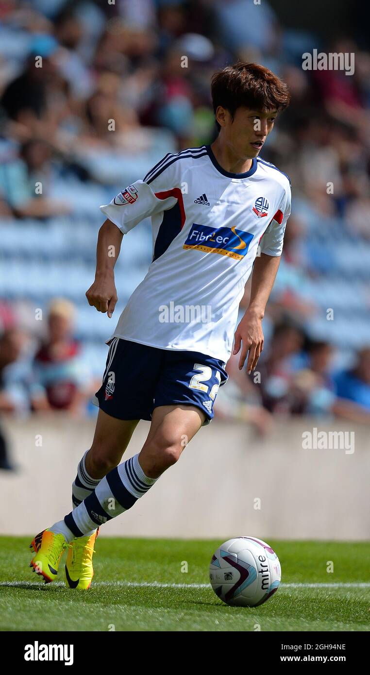 Lee Chung-Yong of Bolton Wanderers in action during the Sky Bet Championship match between Burnley and Bolton Wanderers in Turf Moor Stadium, Burnley, United Kingdom on Aug. 3, 2013. Stock Photo
